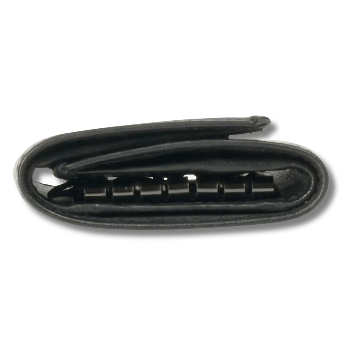 Interior detail of a soft black leather wallet showcasing its smooth finish and functional compartments