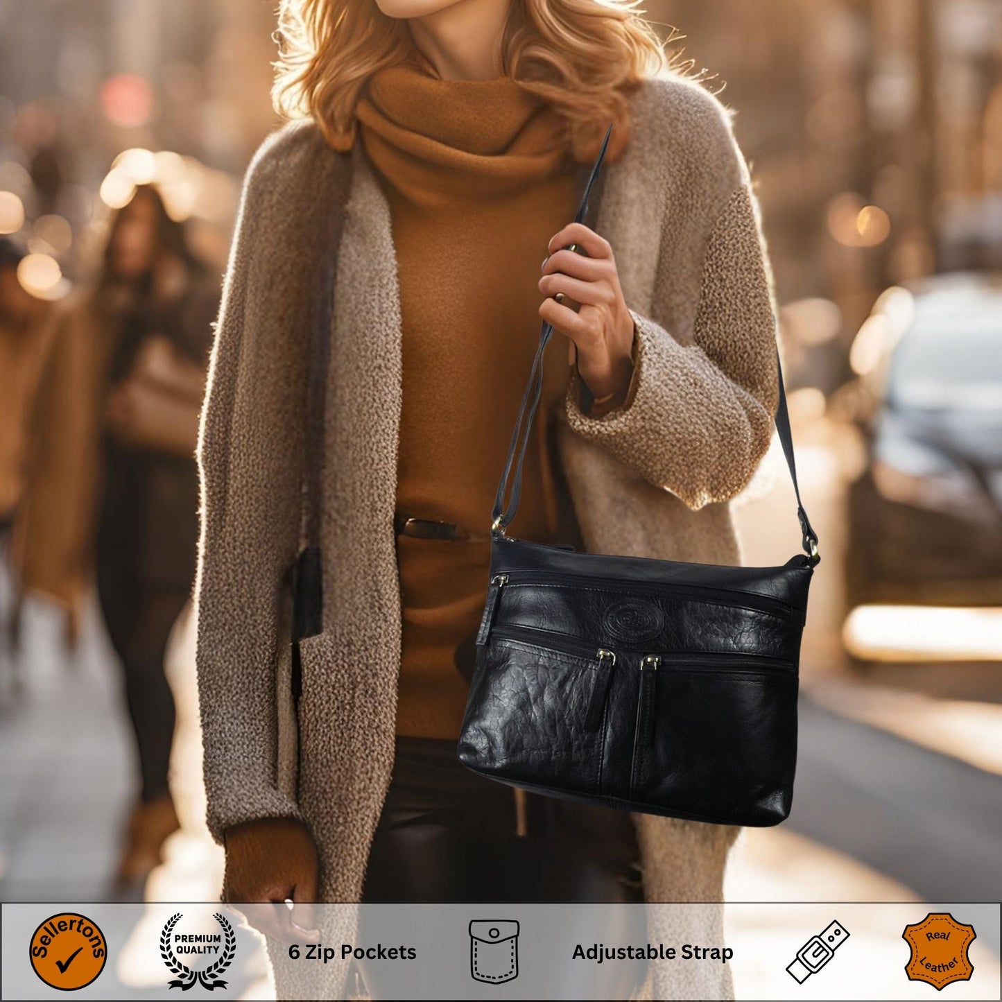A woman wearing a stylish black leather crossbody bag with six zip pockets and an adjustable strap, perfect for casual and everyday wear.