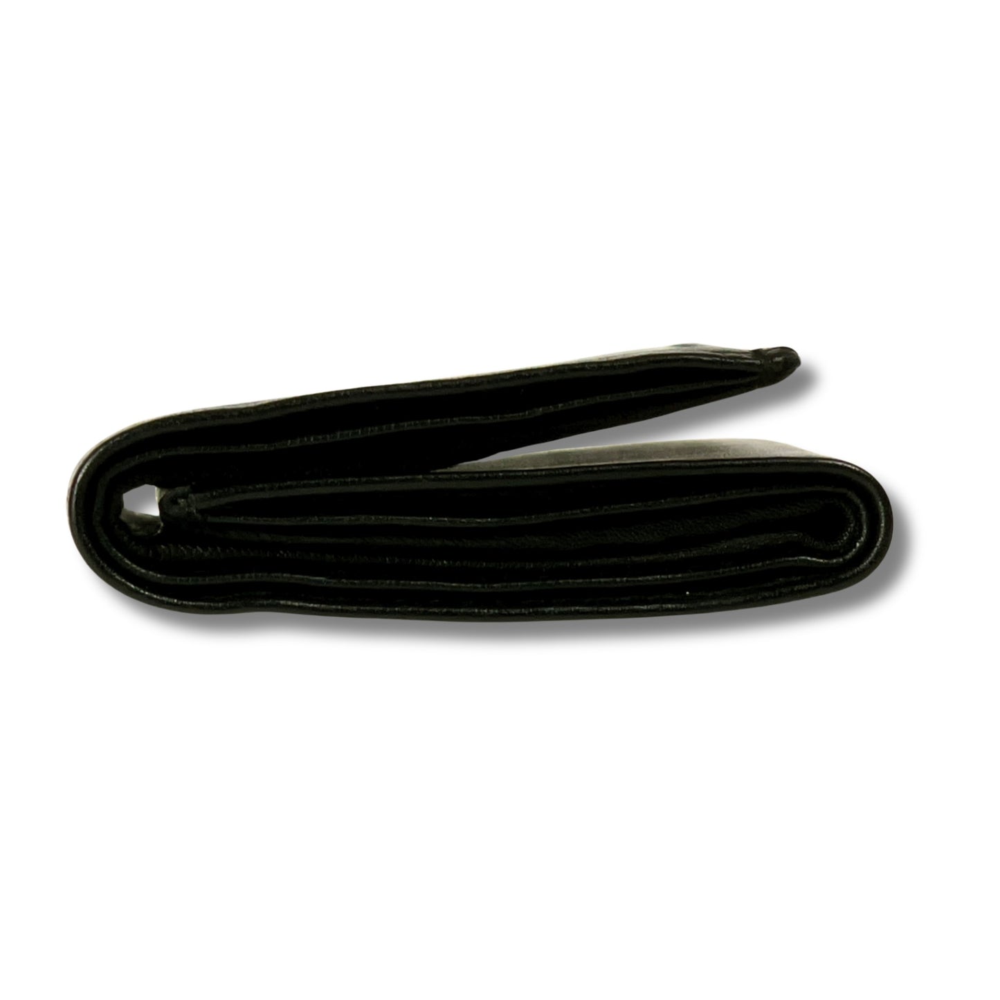 Side profile of a closed black leather trifold wallet made from premium Nappa leather