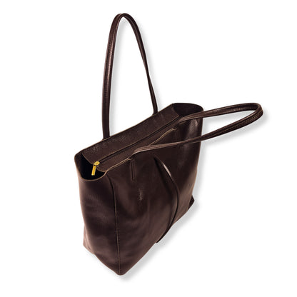 Top  view of dark chocolate real leather tote bag with visible zip and roomy interior
