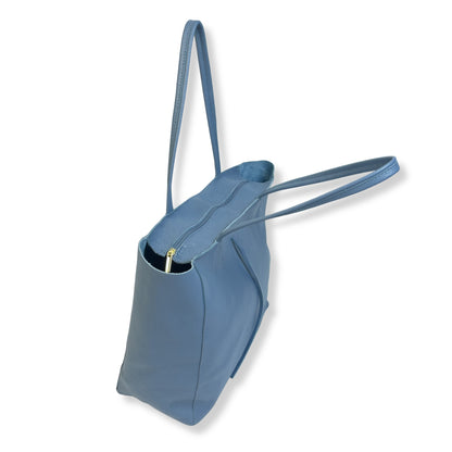 Top view showing zip top and soft tie straps denim blue real leather tote bag