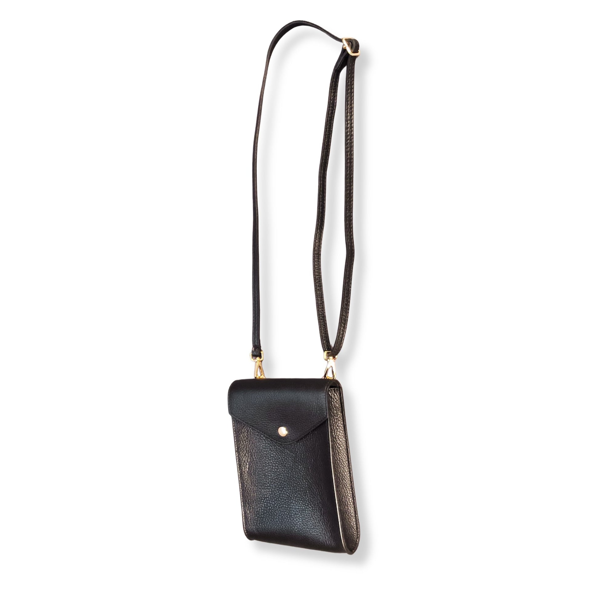 Black leather crossbody bag laid flat showing full adjustable strap
