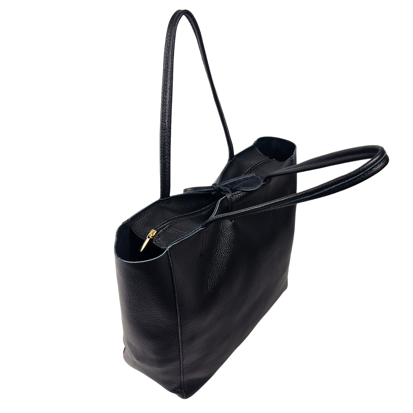 Top tie detail of black full-grain leather tote bag showing secure closure design