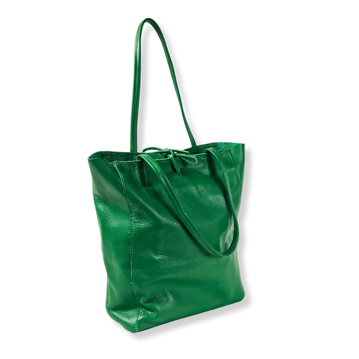 Angled view of handcrafted green leather tote bag showing contours and stitching