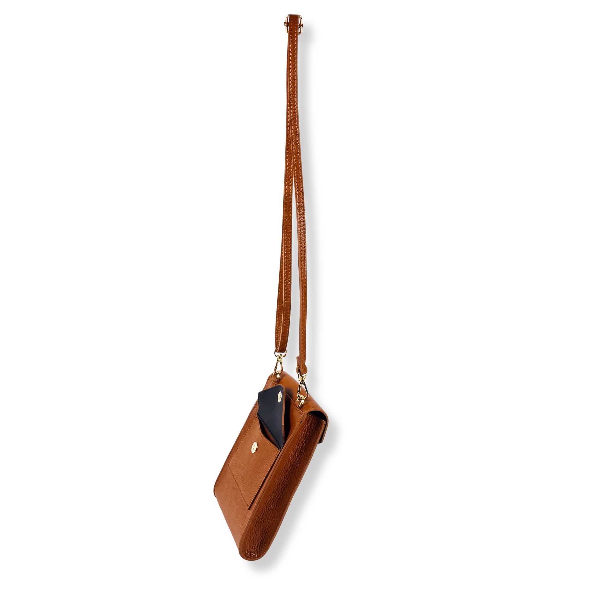 Side/back view of dark tan leather bag with strap
