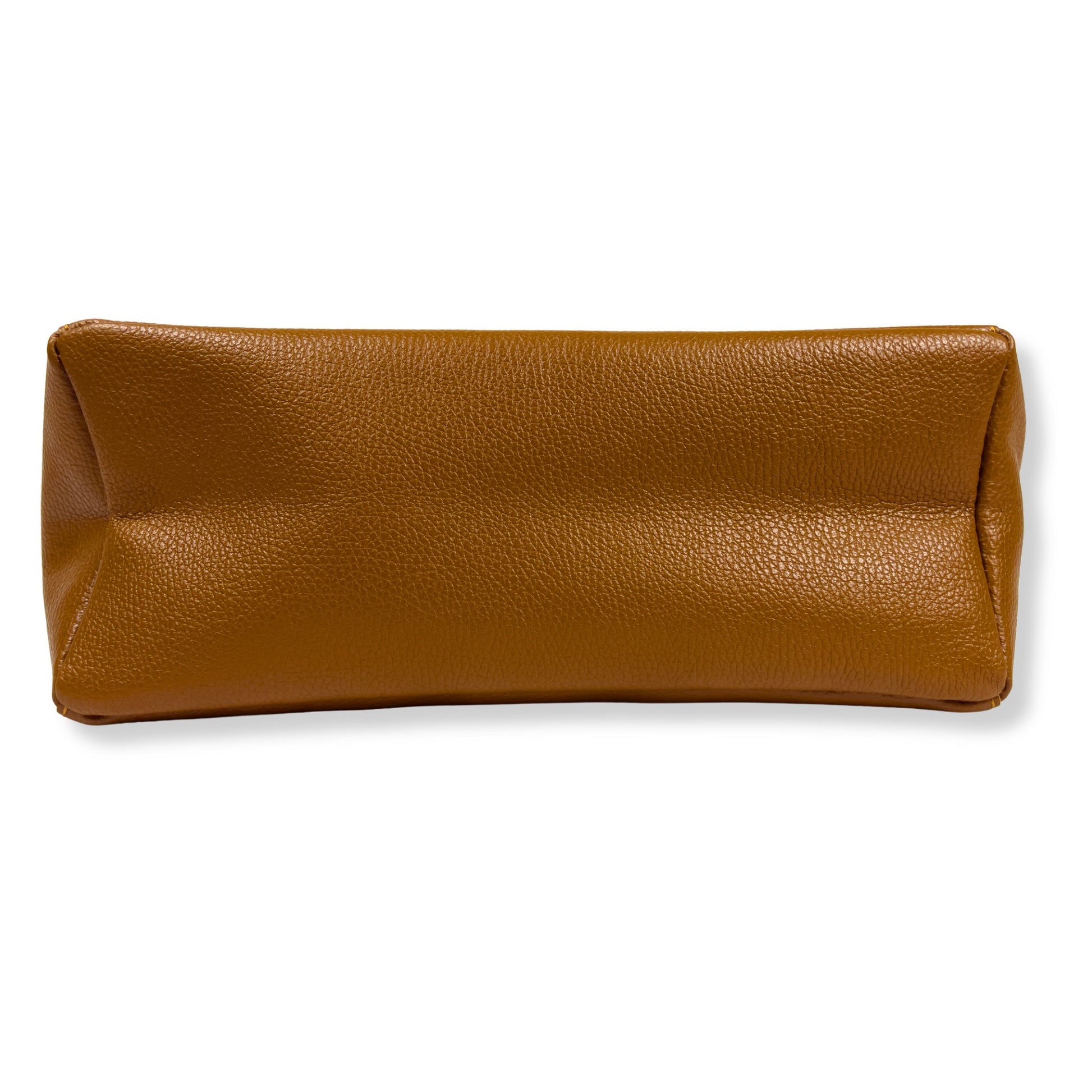 Bottom view highlighting texture and tone of dark-tan leather tote bag.