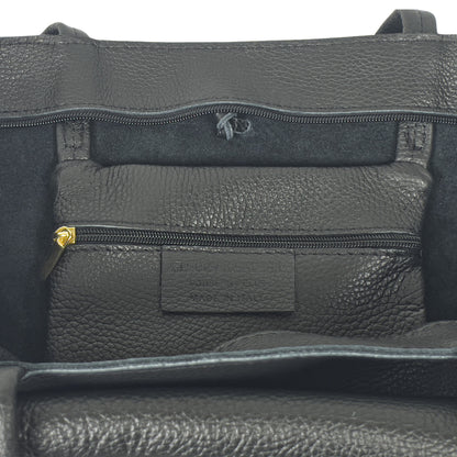 Internal pocket detail of black Italian leather tote bag with zip and soft lining
