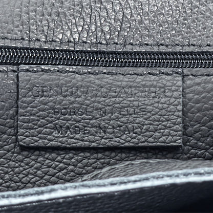 Interior stitching close-up showing functional features of the Black real leather tote.