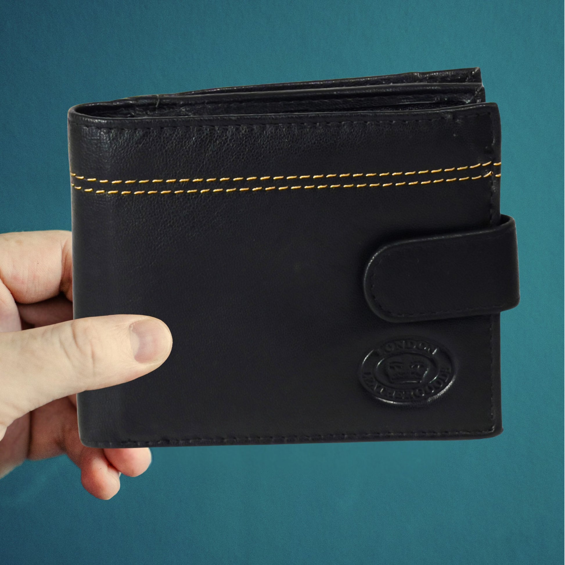 Front of closed black and tan leather wallet featuring sleek design and RFID-blocking