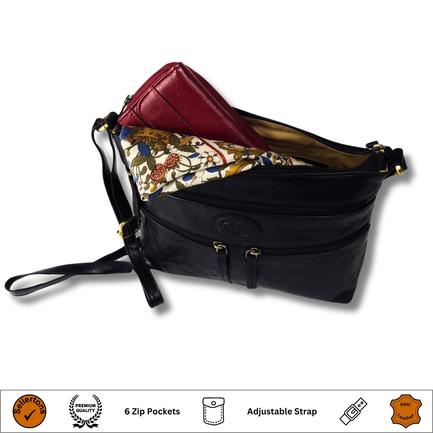 Open compartments of a black leather crossbody bag showing storage space
