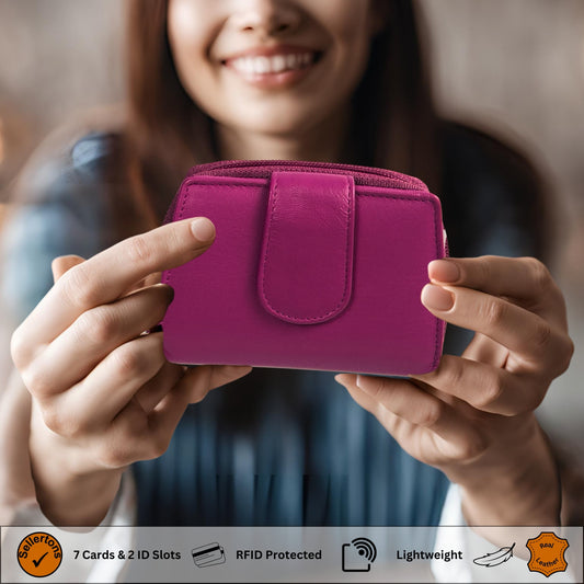 Woman holding a pink RFID wallet made of soft Nappa leather.